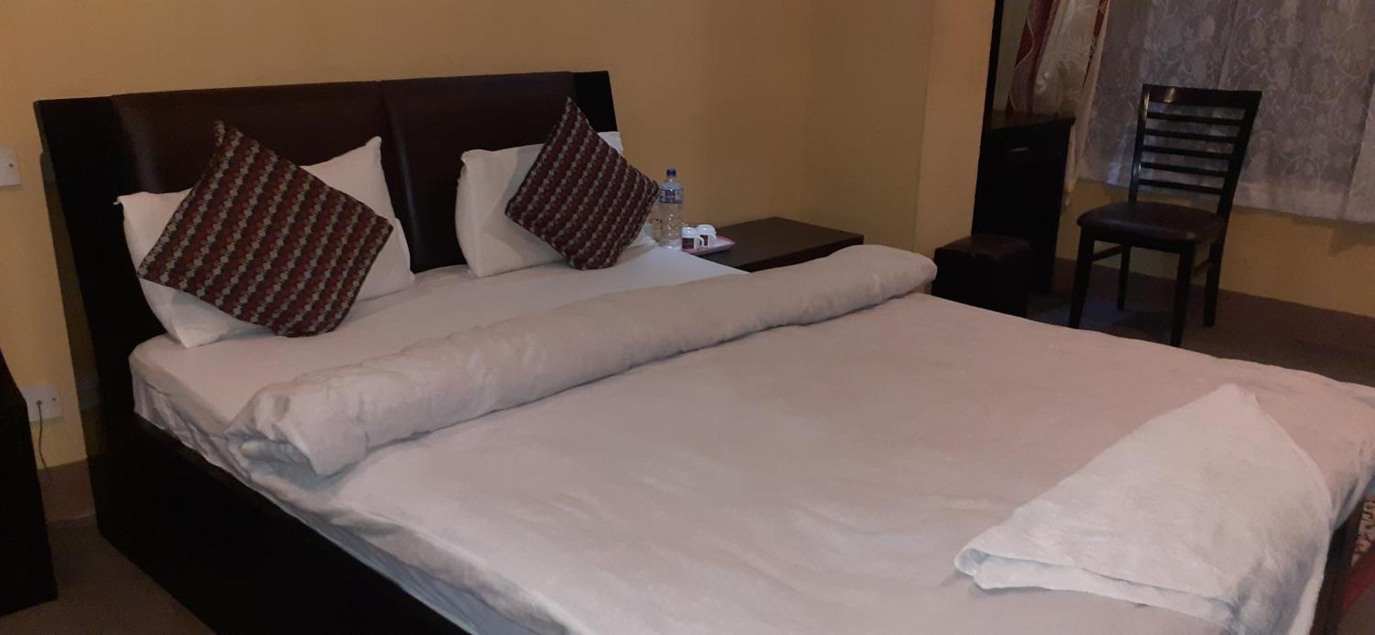 Готель Ambience House Lalitpur Номер фото